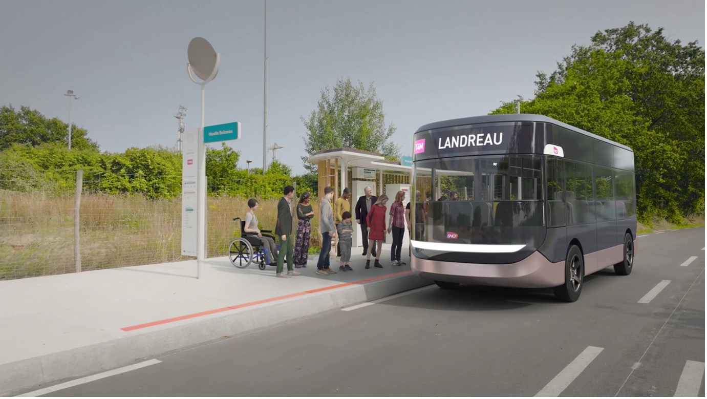 Minibus robotisé stationné devant un arrêt de bus